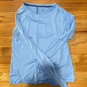 Champion long sleeve baby blue athletic shirt. Size xs